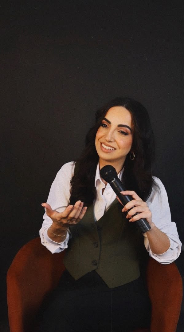Paula interviewing a guest